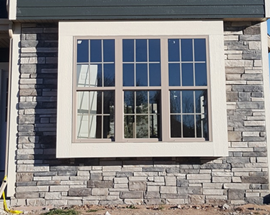 Cultured Stone exterior veneer installation by Badgerland Fireplace