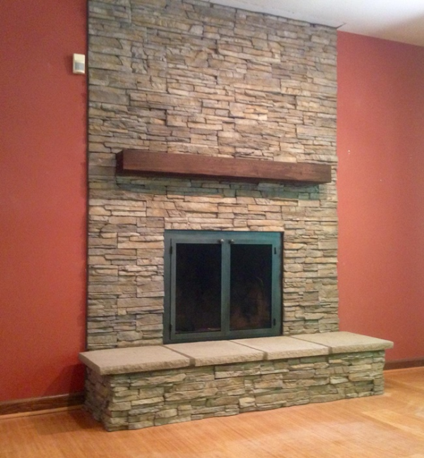 Stone veneer fireplace surround